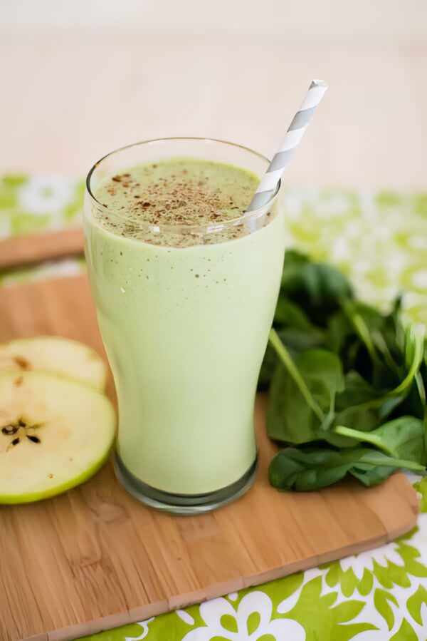 green apple smoothie being served