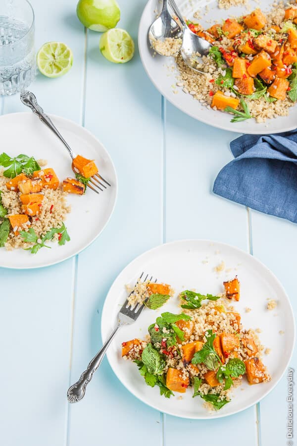 pumpkin quinoa salad being served on a white table