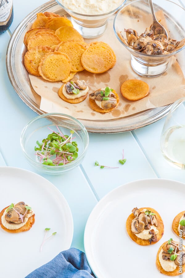 Chickpea Blini with Hummus and Mushrooms - these baby socca are vegan and gluten free and perfect for your next party!| deliciouseveryday.com