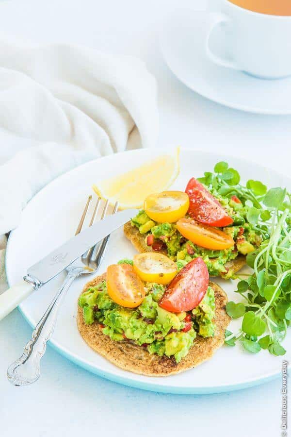 Chickpea pancakes with avocado tomato and watercress - a wonderful satisfying vegan breakfast to kick start your day | DeliciousEveryday.com