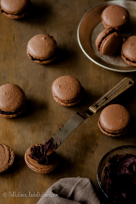 Chocolate macarons filled with dark chocolate ganche recipe | via deliciouseveryday.com