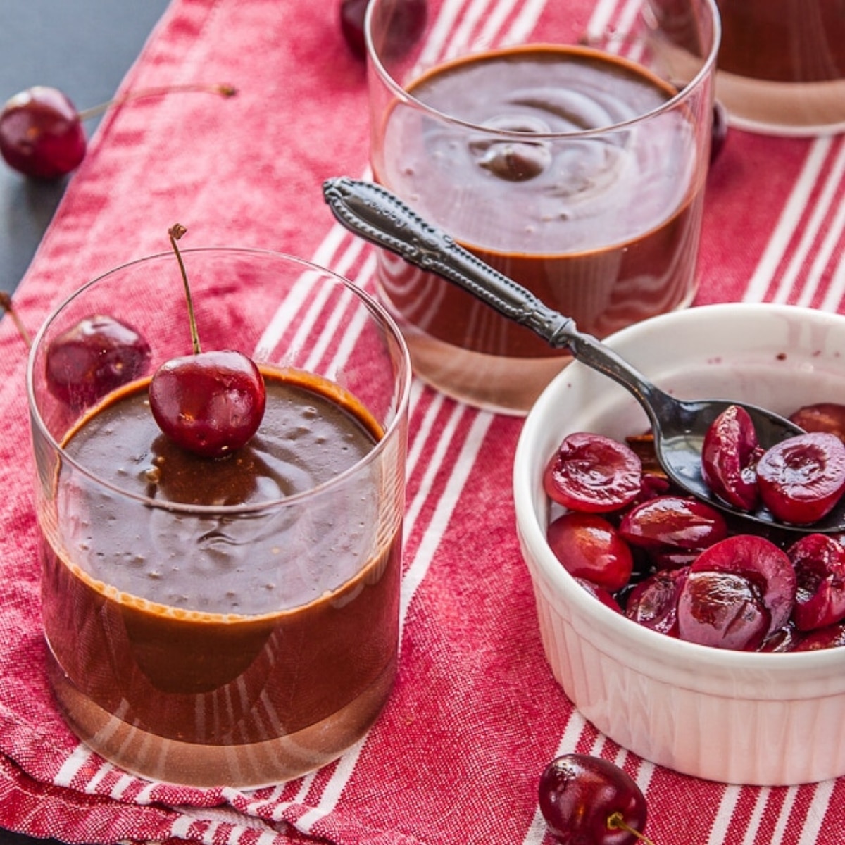 Chocolate pots de creme with red wine poached cherries