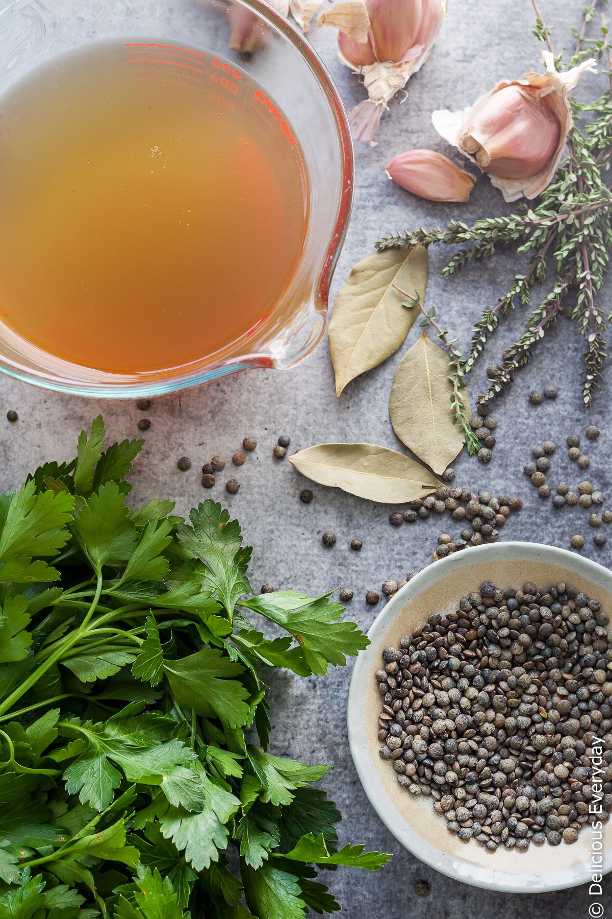 How to make vegetable stock - Save money by making your own delicious vegetable stock. It's easy! Not only is it cheaper than store bought it tastes so much better. If you've ever wondered how to make vegetable stock here are my tips to making a delicious stock every time.