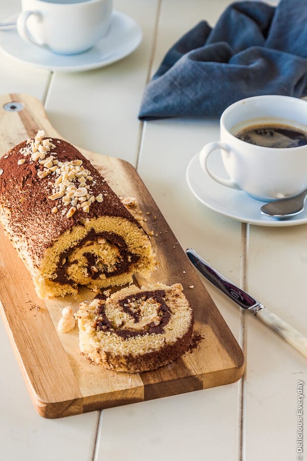 Nutella roulade (swiss roll cake) with toasted hazelnuts recipe | deliciouseveryday.com