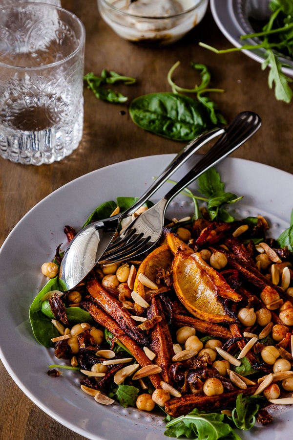 Roasted Moroccan Carrot Salad with Chickpeas Recipe - this fantastic vegetarian salad is packed full of spices and hearty and satisfying enough to feed a crowd | Get the recipe at deliciouseveryday.com
