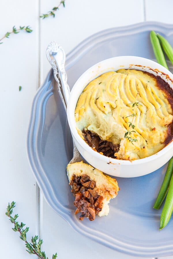 Vegan Shepherds Pie Recipe - the British classic gets a vegan makeover and lightened up with mushrooms and cauliflower. Try this low carb, vegan and gluten free Vegan Shepherds Pie today | DeliciousEveryday.com