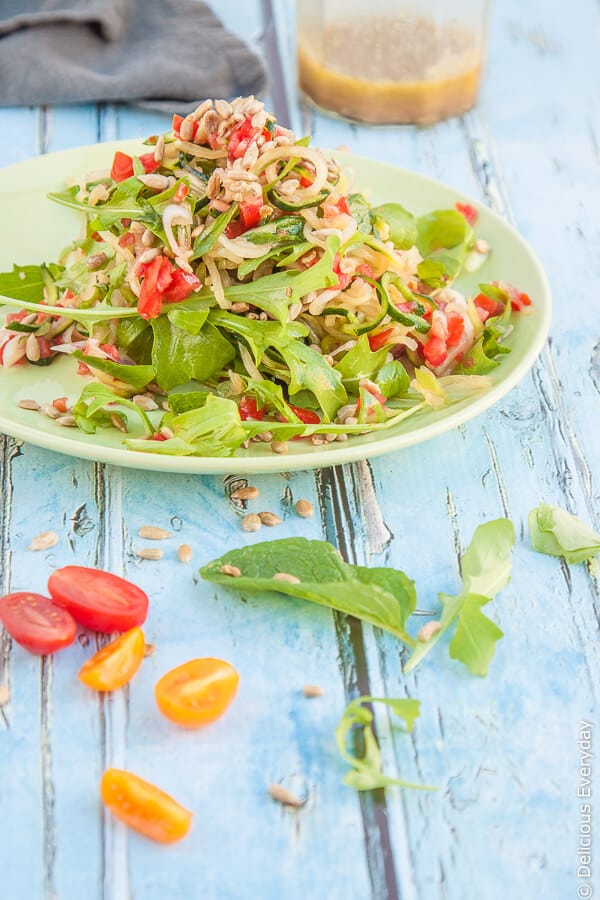 Zucchini Noodle Recipe - this vegan salad is packed full of veggie goodness with zucchini noodles, tomato, mint and more. | Get the recipe at DeliciousEveryday.com