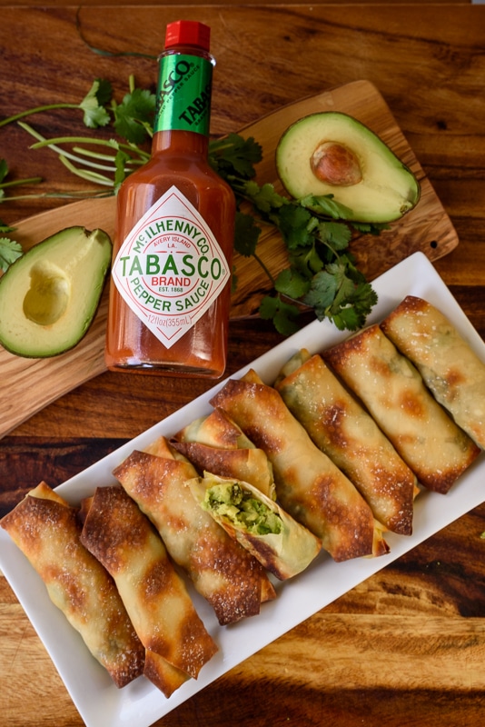sweet and spicy avocado egg rolls with tabasco