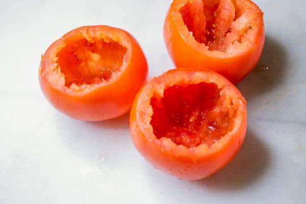 cored tomatoes ready for stuffing