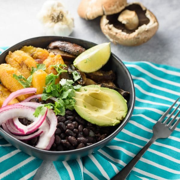 adobo spiced buddha bowl with blue napkin