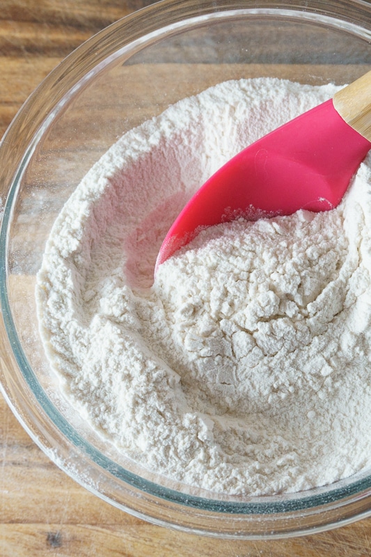 mixing flour for chai spiced pancakes