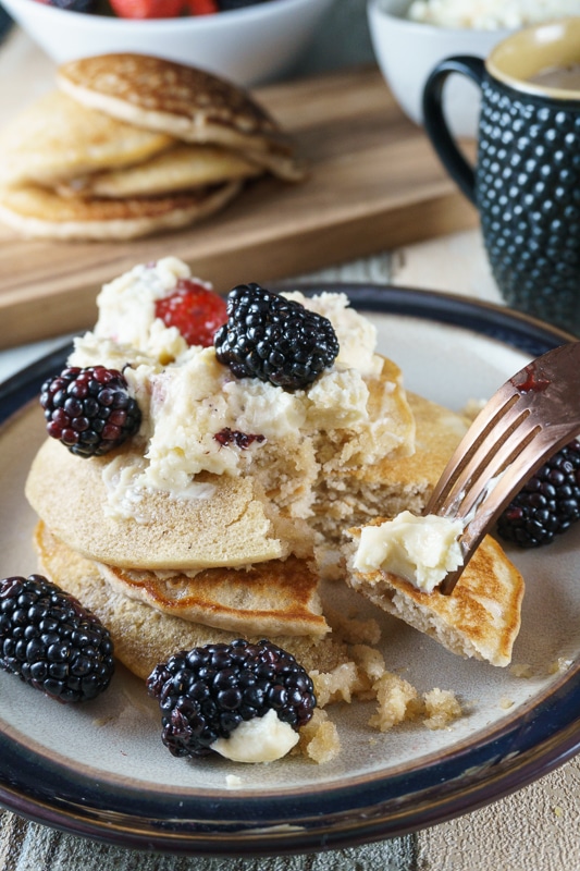 fork digging into chai spiced pancakes