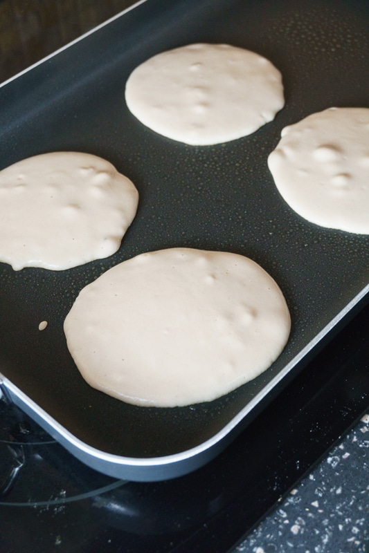 cooking pancakes on the griddle