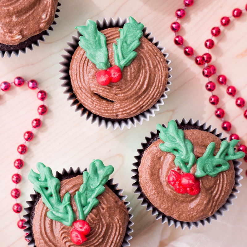 holly cupcakes for christmas being served