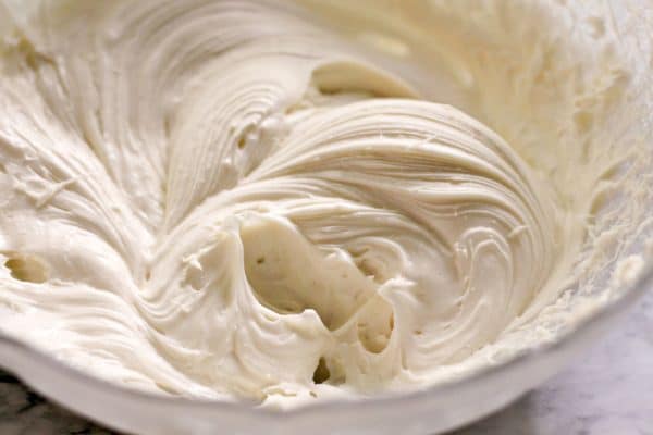 cream cheese frosting in a bowl