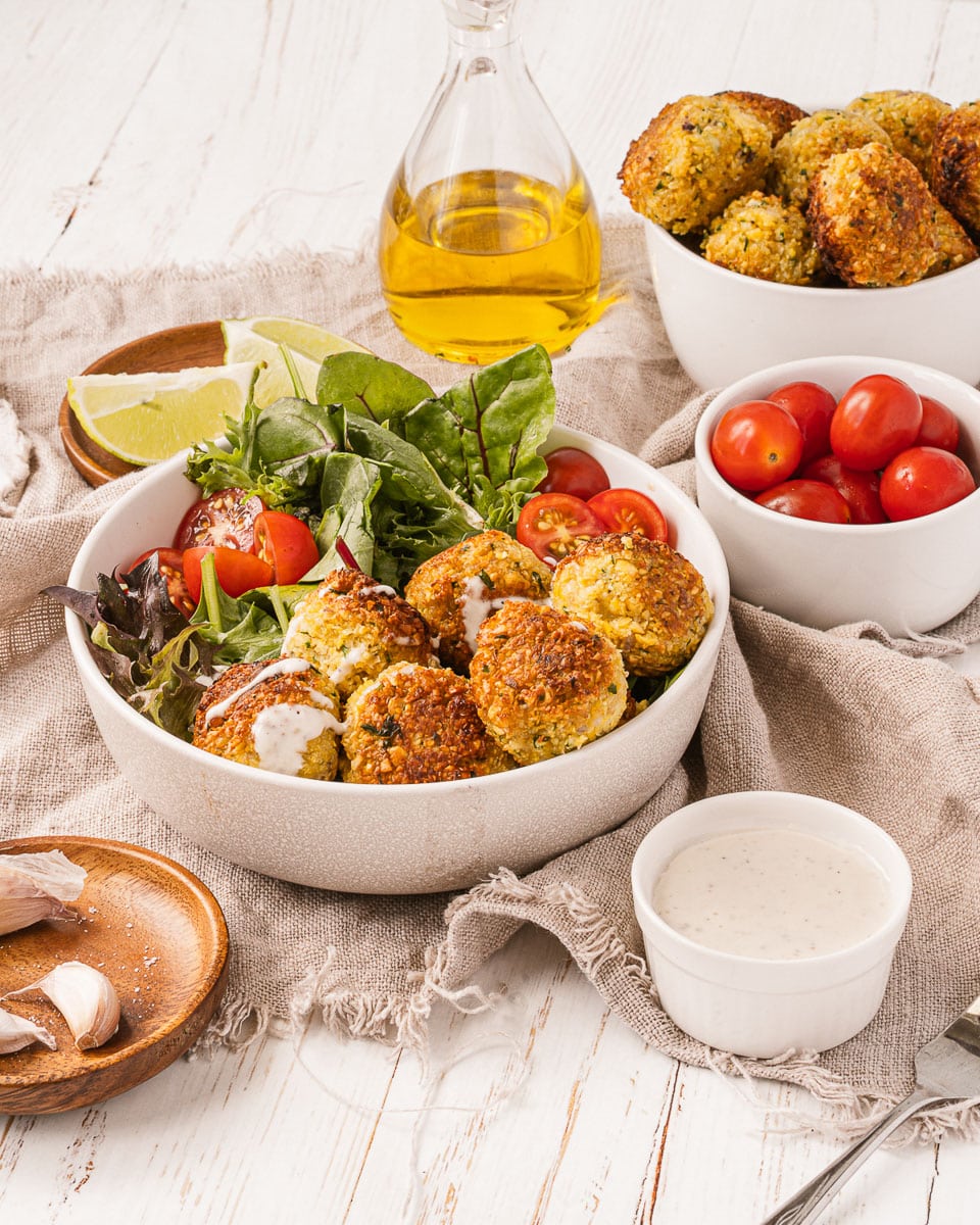 vegan falafels in a bowl with salad