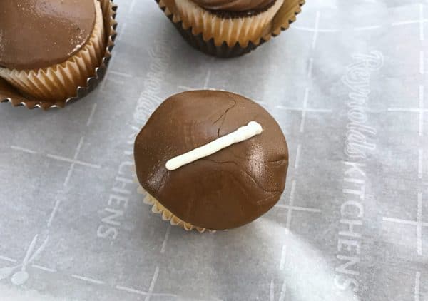 drawing hash marks on football cupcakes