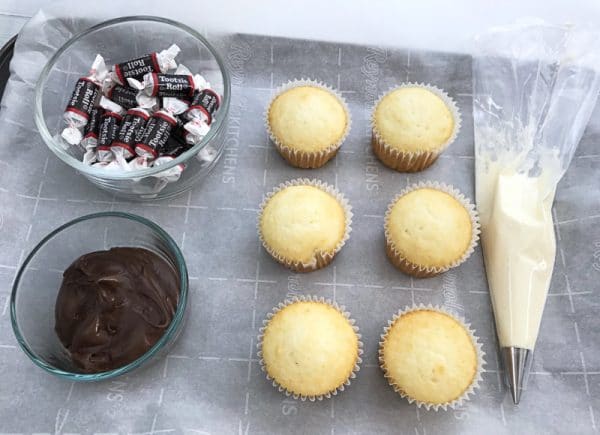 getting ready to decorate football cupcakes