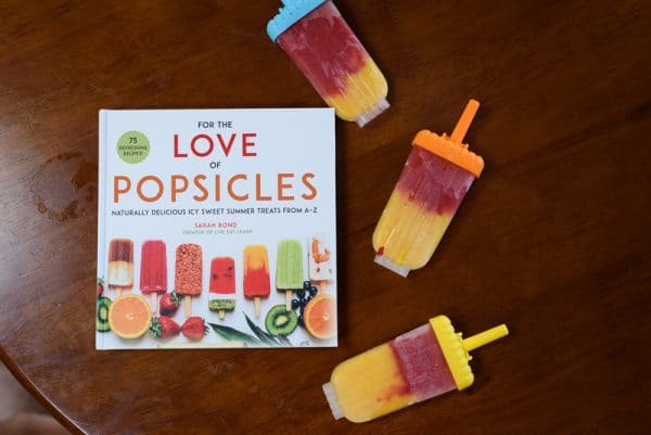 popsicle coookbook with popsicles on a table