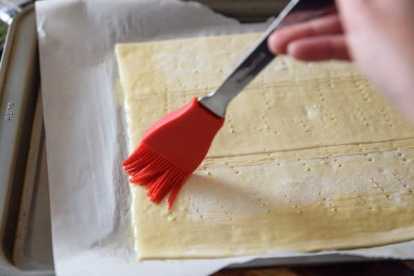 brush egg wash on puff pastry