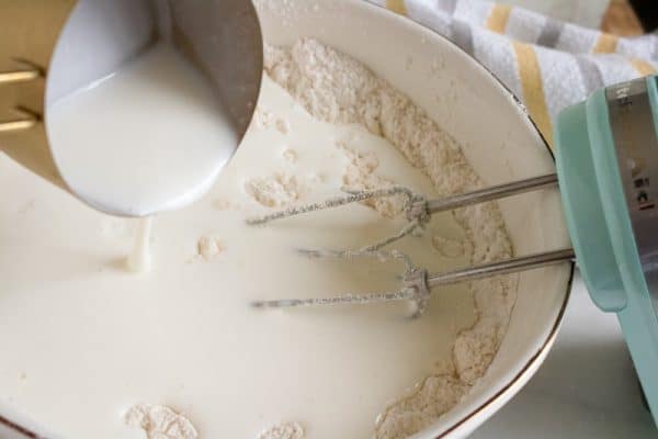 mixing the ingredients for homemade buttermilk biscuits