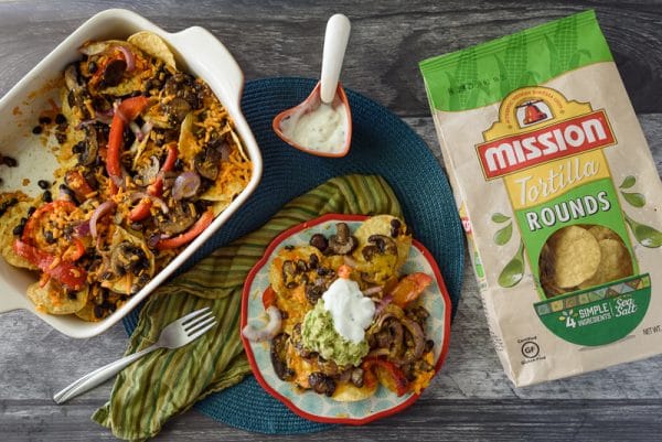 loaded vegan nachos being served