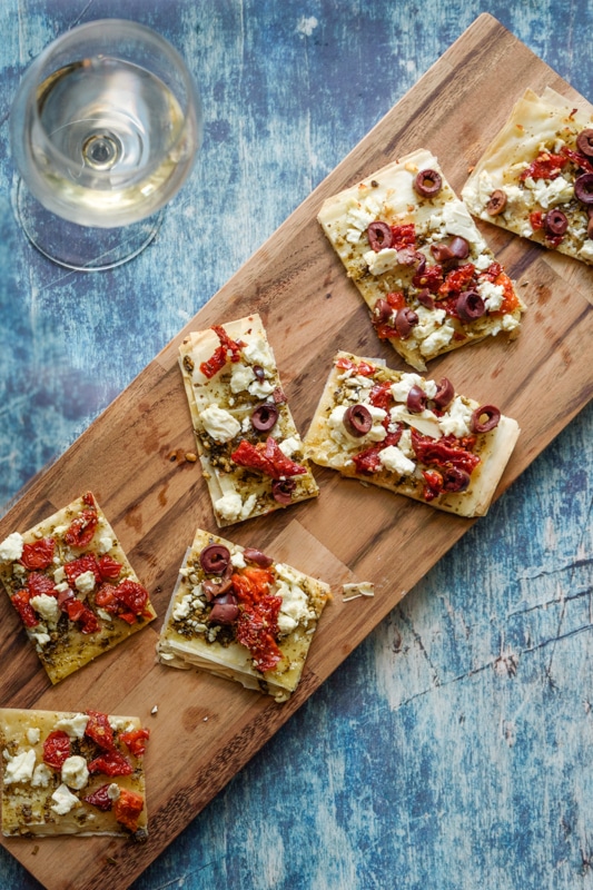 mediterranean flatbread and a glass of wine