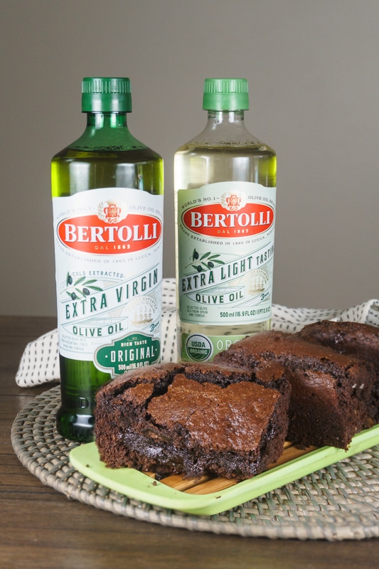 olive oil bottles and brownies being served