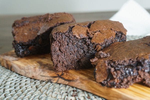 double chocolate olive oil brownies on cutting board