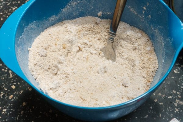 mixing dry ingredients for olive oil brownies