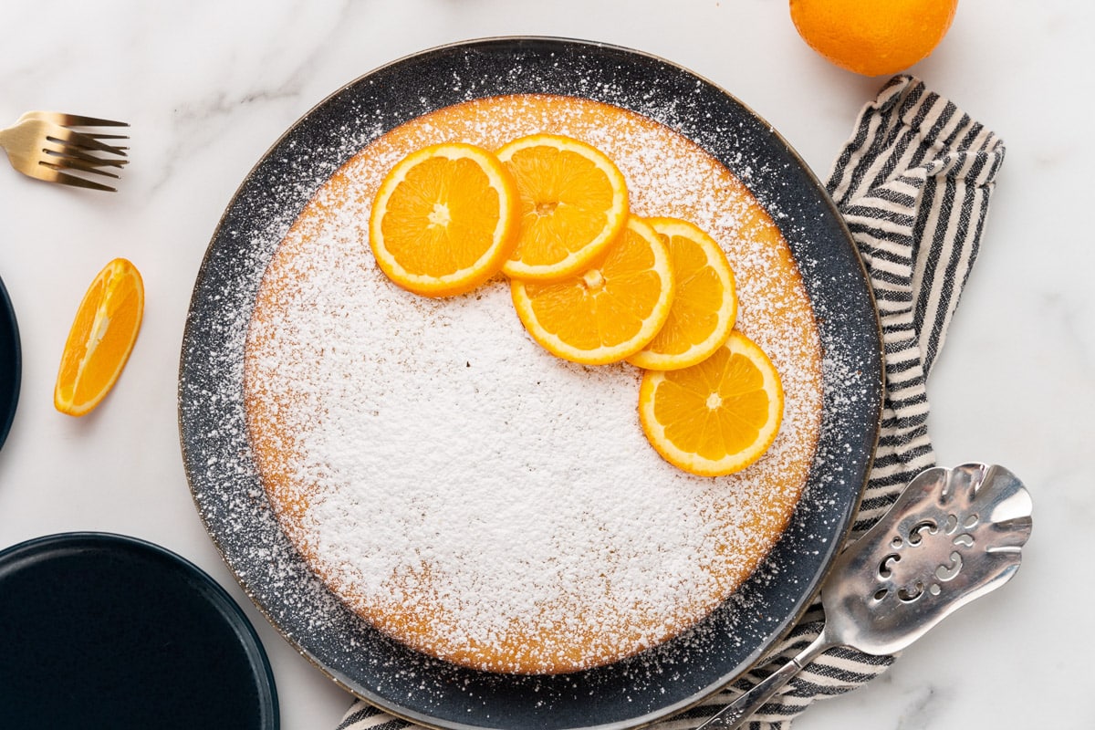 orange olive oil cake being served