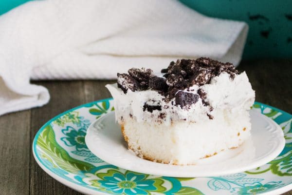 Oreo poke cake on a serving dish