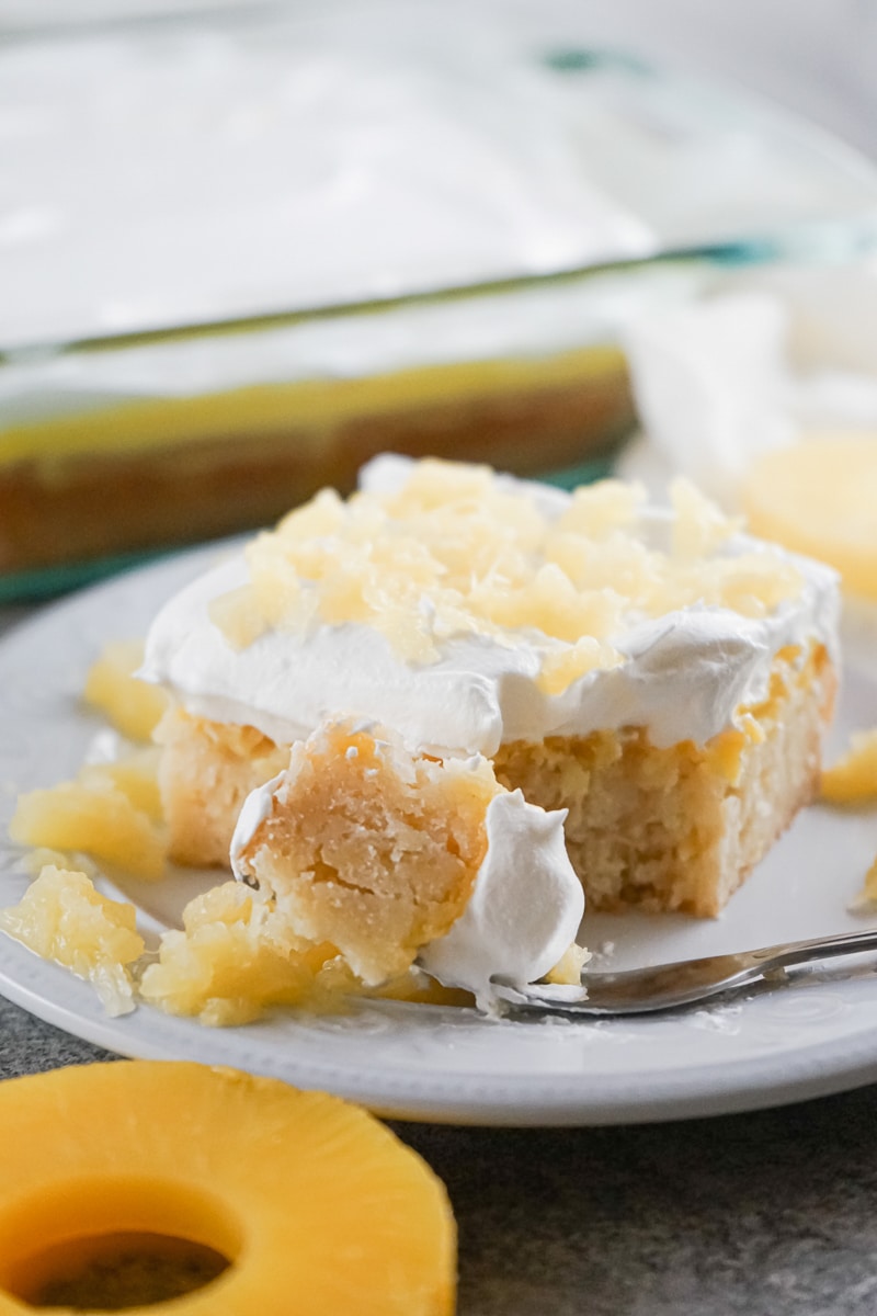 forkful of Pineapple Poke Cake