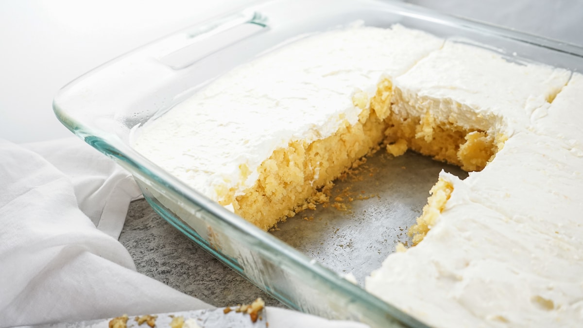 pineapple sunshine cake with slice cut out