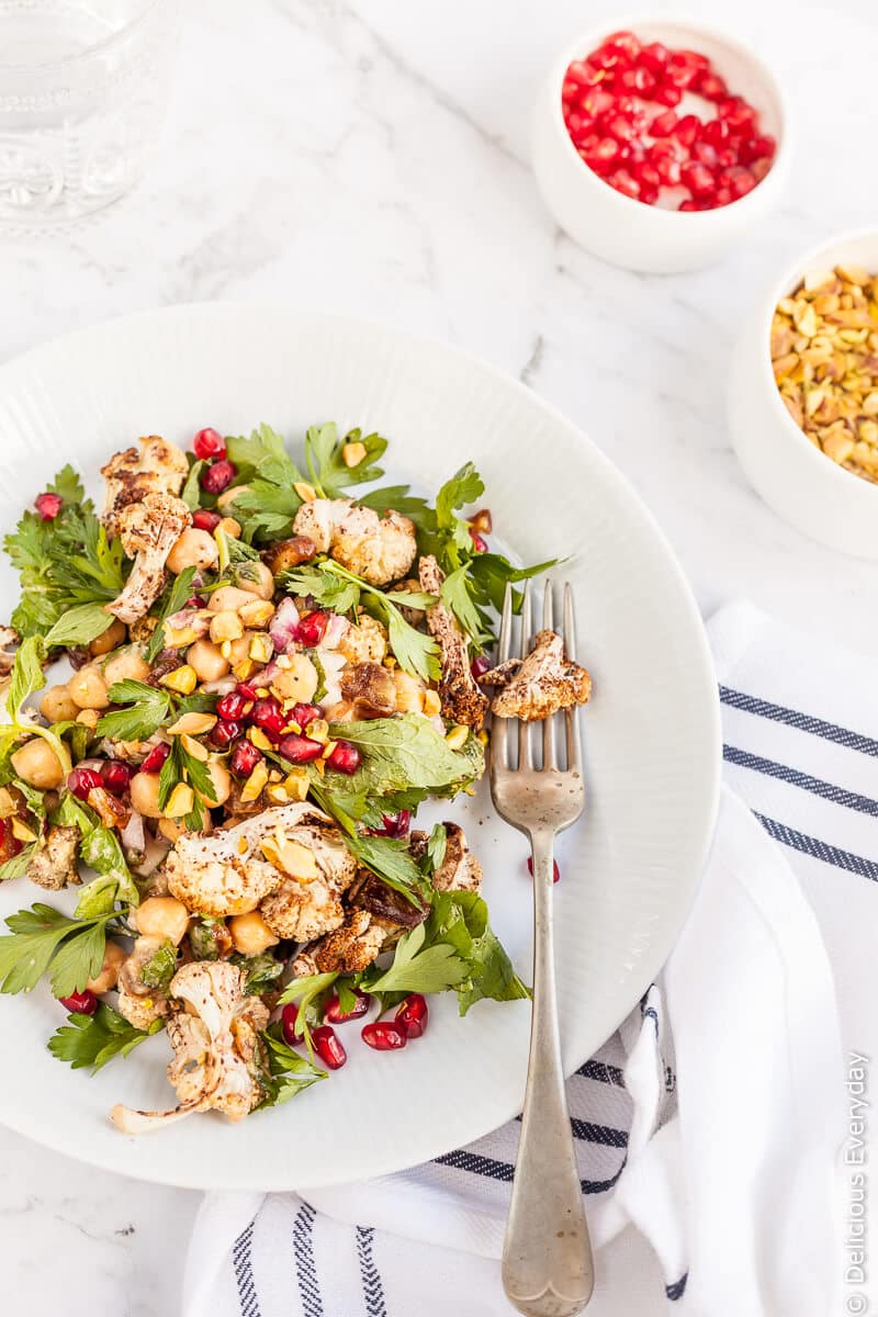 Think you don't like cauliflower? Think again! This Sumac Roasted Cauliflower Salad takes cauliflower to a whole new level. Paired with Medjool dates, pomegranate and mint and parsley this beautiful salad is an explosion of flavours and textures. 