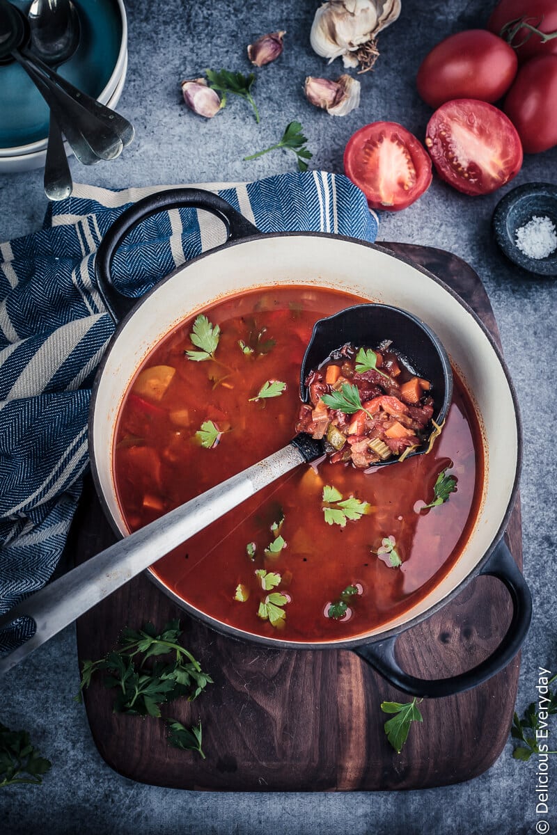This rustic Smoky Tomato Soup is packed with vegetables and roasted peppers and spices. Flavourful, speedy and healthy this soup is a great weeknight meal.