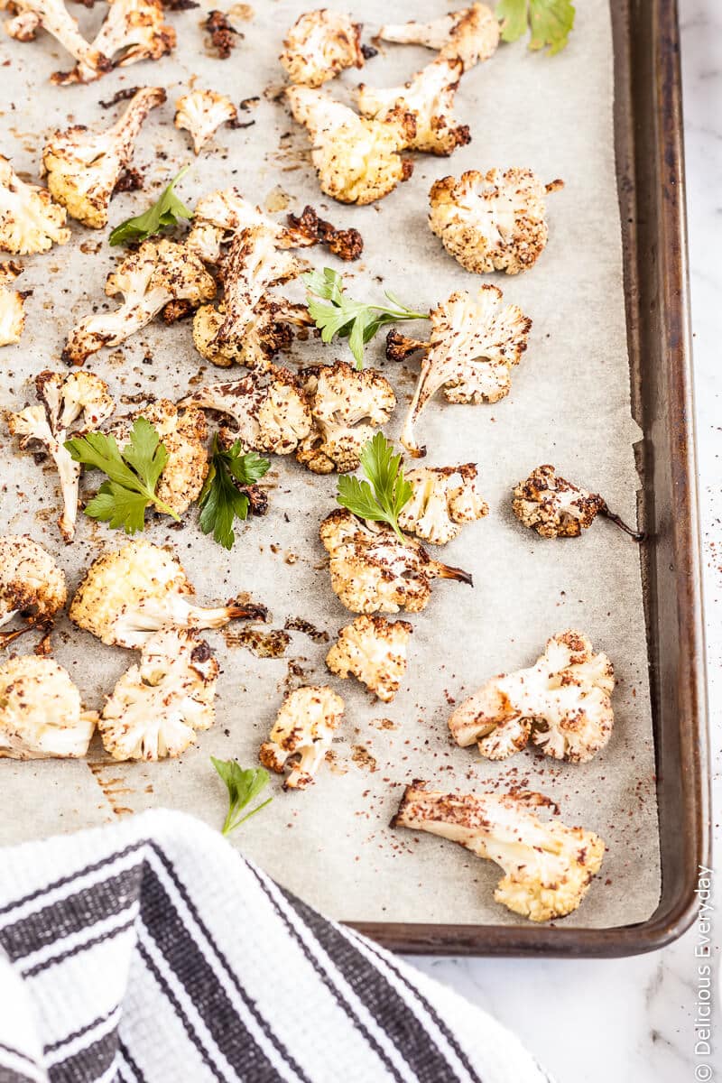 Think you don't like cauliflower? Think again! This Sumac Roasted Cauliflower Salad takes cauliflower to a whole new level. Paired with Medjool dates, pomegranate and mint and parsley this beautiful salad is an explosion of flavours and textures. 