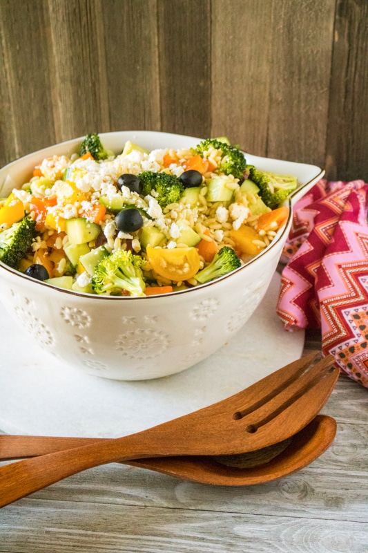 summer orzo salad in a serving dish