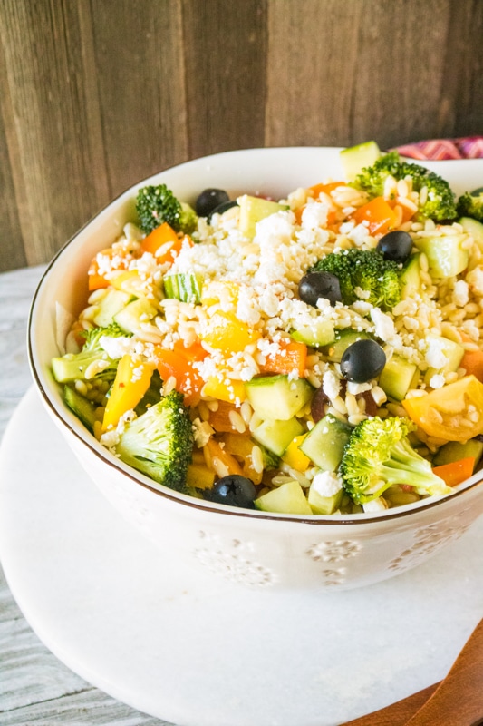 easy orzo salad being served