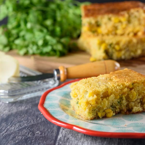 sweet and spicy cornbread being served on a colorful dish