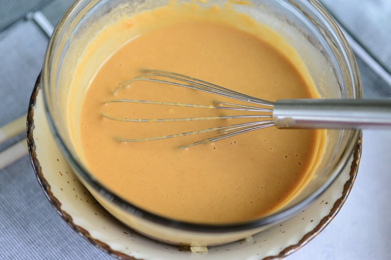 thai peanut sauce being served 