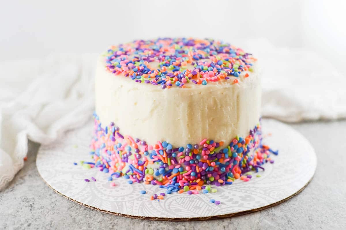 vegan birthday cake uncut on a platter