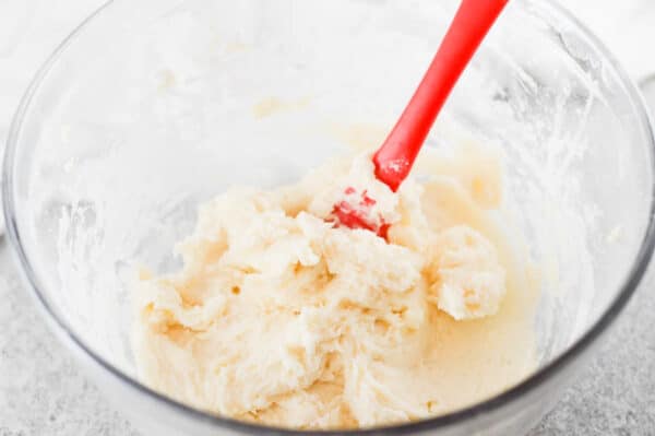 vegan buttercream frosting being mixed in a bowl