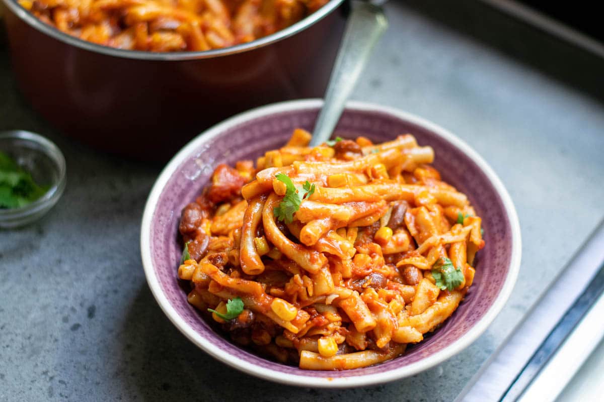 one pot vegan chili Mac in purple bowl