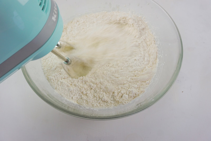 whisking vegan donut batter