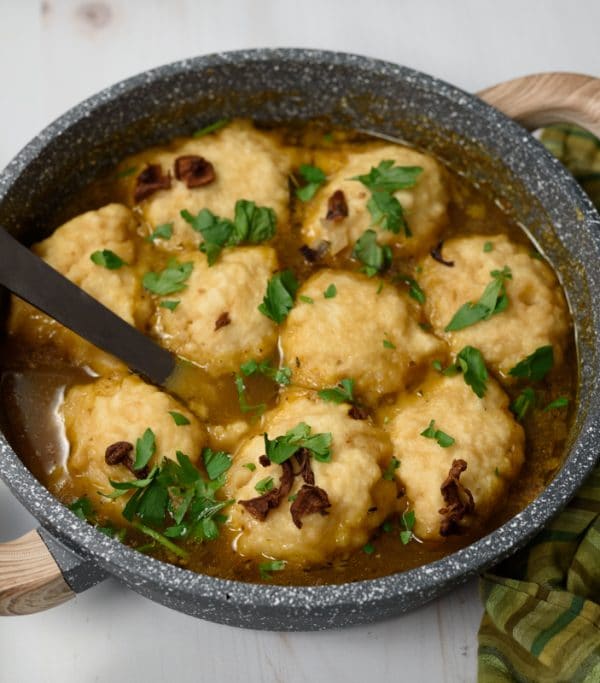 vegan chicken and dumplings made with mushroom broth and vegetarian dumplings