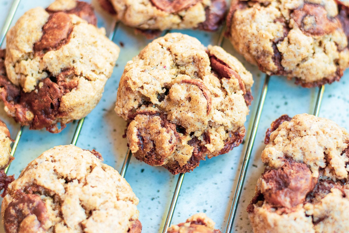 vegan gluten free chocolate chip cookies on a cooling tray