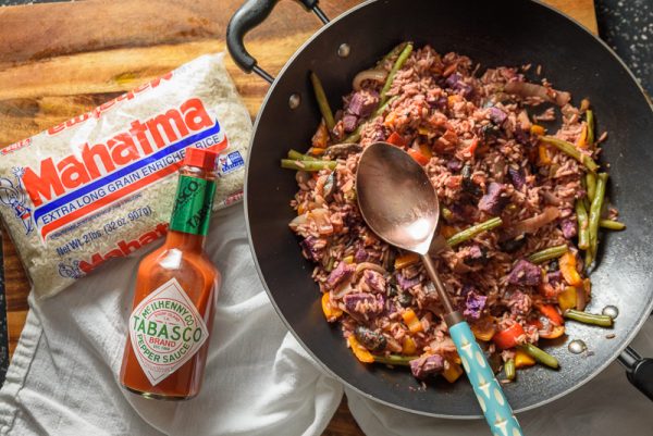 vegan jambalaya with rice and hot sauce