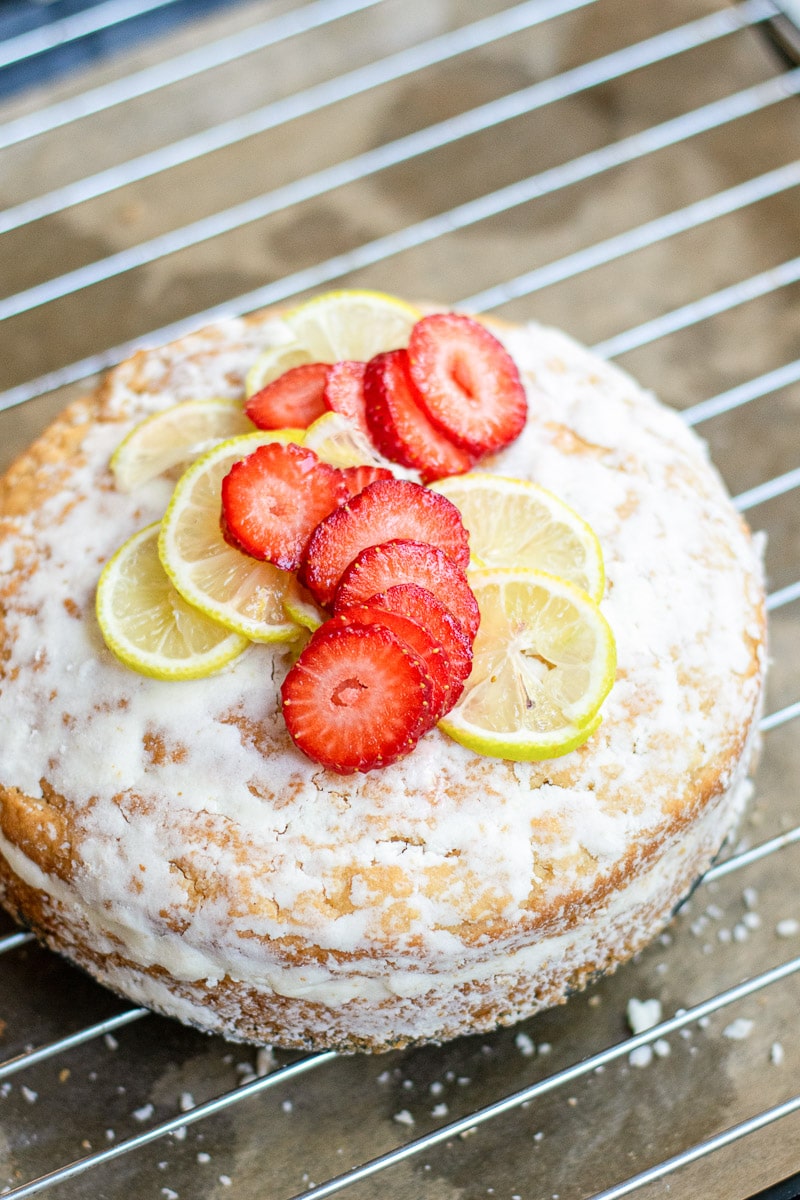 vegan lemon cake topped with fruit