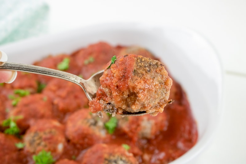 vegan meatballs being eaten with a spoon